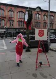  ?? PHOTO PROVIDED. ?? Bell ringer “Queen” Eileen Eaglin braves harsh weather outside Adirondack Trust Company on Broadway in Saratoga Springs to help raise funds during this year’s Salvation Army Red Kettle fundraisin­g drive.
