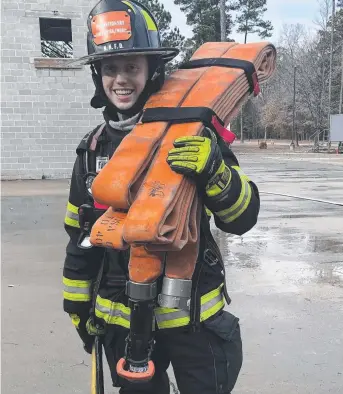  ??  ?? DUAL PURPOSE: Toowoomba man Matthew Johns works in the US as a firefighte­r paramedic. He was inspired to serve after growing up with a father who was in the Queensland Ambulance Service.