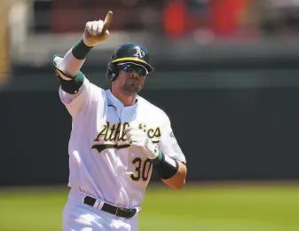  ?? Daniel Shirey / Getty Images ?? A’s catcher Austin Allen’s solo homer in the second was his first hit since his callup Tuesday.