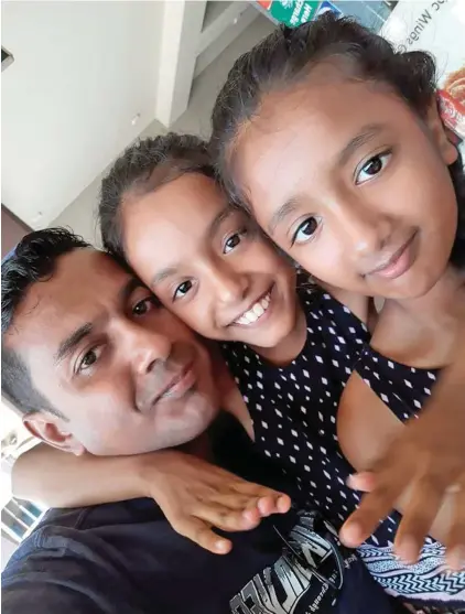  ??  ?? Happier times... Salvin Singh in an earlier photo with his daughters Sanah and Samarah before the girls were found dead at the Nausori Highlands.