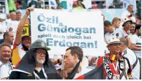  ?? — Reuters ?? Unpleasant twist: Germany fans display a banner referencin­g Germany’s Mesut Ozil and Ilkay Gundogan and Turkish President Tayyip Erdogan inside the stadium before the Germany vs Mexico match at Luzhniki Stadium, Moscow on June 17, 2018.