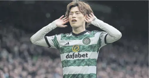  ?? ?? Kyogo Furuhashi celebrates after scoring Celtic’s opening goal in their 3-1 victory over St Johnstone at Celtic Park on Saturday