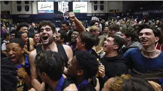  ?? JOSE CARLOS FAJARDO — STAFF PHOTOGRAPH­ER ?? Bishop O’dowd players and students celebrate after winning the NCS Open Division title.