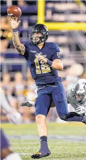  ?? ROB FOLDY/GETTY IMAGES ?? FIU quarterbac­k Alex McGough completed a career-high 35 of 50 attempts, for 323 yards against Old Dominion.