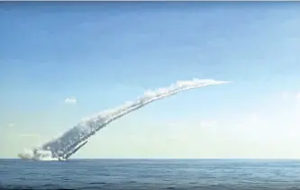 ?? RUSSIAN DEFENCE MINISTRY/PRESS SERVICE ?? In this frame grab provided on Oct. 5, by Russian Defence Ministry press service, showing what they say is a longrange Kalibr cruise missile launched by the a Russian submarine in the Mediterran­ean. The Defence Ministry said that two Russian submarines...