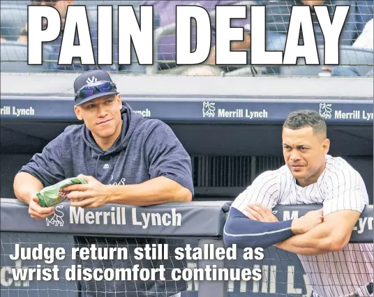  ?? Corey Sipkin ?? OUT IN RIGHT FIELD: Aaron Judge (left) says he still doesn’t know when he might be back from a chip fracture in his right wrist — an injury that was supposed to keep the Yankees right fielder out three or four weeks, but now has had him on the DL for five. With no return in sight, Giancarlo Stanton (right) was in Tuesday’s lineup in right field despite a tight left hamstring.