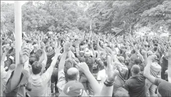  ??  ?? Petrotrin workers being addressed by OWTU president general Ancel Roget