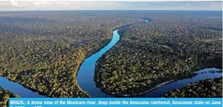  ?? ?? BRAZIL: A drone view of the Manicore river, deep inside the Amazonia rainforest, Amazonas state on June 7, 2022. — AFP