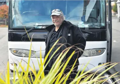  ?? PHOTO: GREGOR RICHARDSON ?? All aboard . . . Otago Coach Services owner Harry Albert stands in front of one of his buses.