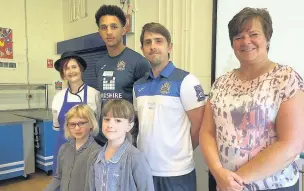  ??  ?? ●●Pictured are runner up Emilia Darul, winner Isabelle Brookes-Mann, from St Philips Primary, cook Kim Edgar, Stockport County player Lewis Montrose, Matthew Bailey, from Stockport County and Solutions SK’s Lisa Tottle