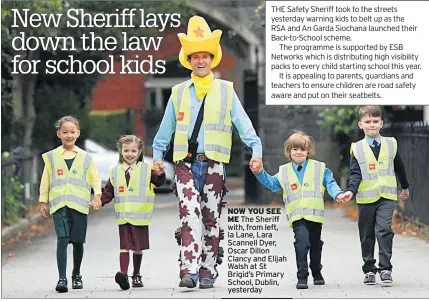  ??  ?? NOW YOU SEE ME The Sheriff with, from left, Ia Lane, Lara Scannell Dyer, Oscar Dillon Clancy and Elijah Walsh at St Brigid’s Primary School, Dublin, yesterday