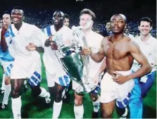  ??  ?? Abedi Pele Ayew (right) and his teammates celebratin­g winning the UEFA Champions League in 1993