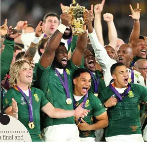  ??  ?? South Africa’s joy as they lift the World Cup in Yokohama