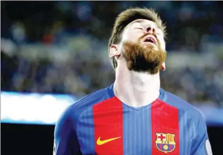  ?? MARCO BERTORELLO/AFP ?? Barcelona forward Lionel Messi reacts during the UEFA Champions League quarterfin­al second leg against Juventus on Wednesday at the Camp Nou stadium in Barcelona. Barca were eliminated after losing 3-0 on aggregate.