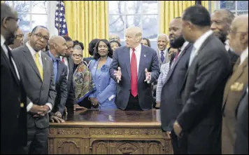  ?? PABLO MARTINEZ MONSIVAIS / AP ?? President Donald Trump meets with leaders of black colleges and universiti­es in the Oval Office of the White House in Washington on Monday.