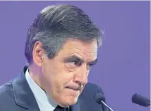  ?? FRANCOIS NASCIMBENI/GETTY IMAGES ?? French presidenti­al candidate Francois Fillon denies allegation­s that he gave his family fake parliament­ary jobs and paid them as much as $1.1 million.