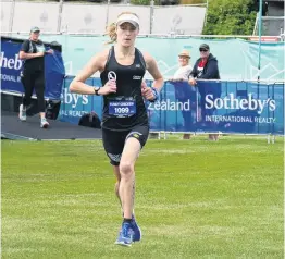  ??  ?? First lady . . . Hannah Oldroyd, of Christchur­ch, on her way to winning the women’s section of the Queenstown Marathon on Saturday in 2hr 55min 12sec.