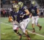  ?? AUSTIN HERTZOG - DIGITAL FIRST MEDIA ?? Spring-Ford quarterbac­k Ryan Engro runs for a first down on a keeper against Boyertown.