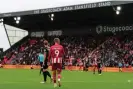  ?? Tom Sandberg/PPAUK/Shuttersto­ck ?? Jay Stansfield playing in front of the Adam Stansfield Stand at Exeter City. Photograph: