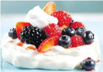  ?? TANGO PHOTOGRAPH­Y/THE CANADIAN PRESS ?? This pavlova recipe uses aquafaba instead of egg whites for the meringue and the coconut topping.