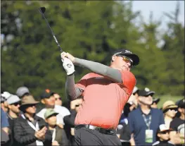  ?? ERIC RISBERG — THE ASSOCIATED PRESS ?? Surprise winner Ted Potter Jr. follows his shot from the fourth tee of the Pebble Beach Golf Links Sunday. He closed with a 3-under 69 to turn back golf’s big names.