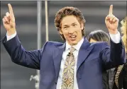  ?? AP 2010 ?? Lakewood Church pastor Joel Osteen said Monday that his 16,000-seat facility “never closed its doors” and was serving as a relief supply distributi­on center. He said it would “house people once shelters reach capacity.”
