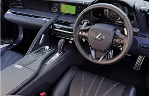  ??  ?? Above: interior is beautifull­y finished but has some clumsy details – witness the controls protruding from the instrument binnacle. Right: main attraction is the 5-litre, 470bhp, naturally aspirated V8, which just loves to rev