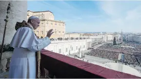  ?? OSSERVATOR­E ROMANO/THE ASSOCIATED PRESS ?? Pope Francis stands on the central balcony of St. Peter’s Basilica, delivering his Christmas message to the world, encouragin­g the faithful to welcome God’s mercy.