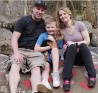  ?? PHOTO FROM GOFUNDME PAGE ?? From left, Josh Knarr, Preston Dray and Pam Snyder. Pam and her son Preston died in floodwater­s on July 11. This family photo was posted on a GoFundMe page set up by friends of the family. Josh and Pam were expecting a second child, a baby girl named Evelynn Rose.