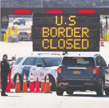  ?? LARS HAGBERG / AFP VIA GETTY IMAGES ?? The Canada-u.s. border will remain closed to all non-essential travel for another month — until June 21 — in
an effort to fight the spread of the coronaviru­s, Prime Minister Justin Trudeau announced Tuesday.