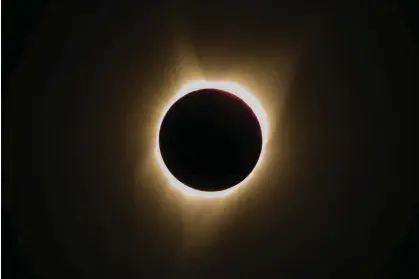  ?? Photograph: Rob Kerr/AFP/Getty Images ?? The total solar eclipse over Oregon on 21 August 2017. Cities and states have declared a state of emergency in expectatio­n of big crowds.