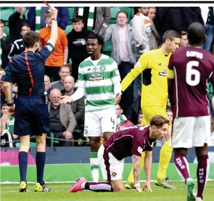  ??  ?? Crude interventi­on: Ambrose saw red for a profession­al foul on Hearts winger Sam Nicholson