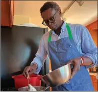  ?? (AP/Haven Daley) ?? Pierre Thiam, executive chef and co-founder of New York-based fine casual food chain Teranga, cooks fonio, a variety of millet, on Jan. 27 in El Cerrito, Calif.