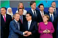 ?? Reuters ?? Angela Merkel along with other European and Asian leaders during a summit in Brussels on Friday. —