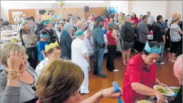  ?? PHOTO/FILE ?? The Open Door Christmas Dinner in Waihi is in its 18th year and still going strong.