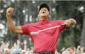  ??  ?? TIGER Woods celebrates on the 18th hole to win the 2019 Masters.
| Reuters