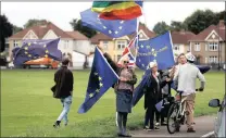  ??  ?? Anti-Brexit campaigner­s protest outside a health and leisure centre in Bristol, England, on Friday. PICTURE: REUTERS