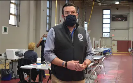  ?? RACHEL RAVINA - MEDIANEWS GROUP ?? Charlie Elison, a spokespers­on for the Federal Emergency Management Agency, addresses members of the media Monday morning at a Disaster Recovery Center located at Montgomery County Community College in Blue Bell.