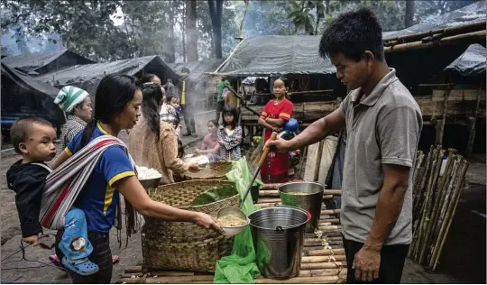  ?? FOR THE WASHINGTON POST ?? Food is cooked centrally at the Mae Hong Son camp and distribute­d twice a day. Myanmar’s military has taken responsibi­lity for attacks on displaceme­nt camps.