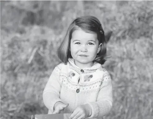  ?? AGENCE FRANCE-PRESSE PHOTO / KENSINGTON PALACE / THE DUCHESS OF CAMBRIDGE ?? A picture released by Kensington Palace and Britain’s Duke and Duchess of Cambridge shows Princess Charlotte of Cambridge at Anmer Hall in the village of Anmer in Norfolk, eastern England, in April, in advance of her second birthday on Tuesday. The...