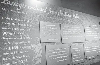  ?? Adelle M. Banks / Religion News Service ?? The Slave Bible exhibit at the Museum of the Bible features a version of the holy book that excluded major portions of the Old and New Testaments.