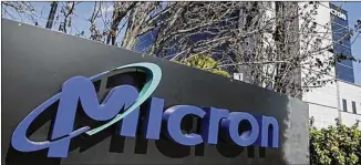  ?? ?? Micron Technology, a maker of semiconduc­tors for computer memory, announced a plan to open a research center in January in Midtown Atlanta that will create about 500 jobs.