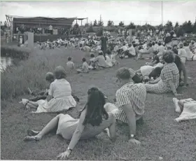  ??  ?? Concert-goers gather on the grounds of the Milwaukee County Zoo to hear a free concert as part of Summerfest 68 on July 28, 1968. The concert, dubbed a “Zoo-mphony,” actually was part of the summer-long Music Under the Stars series, one of several...