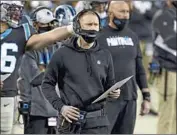  ?? Brian Westerholt Associated Press ?? PANTHERS offensive coordinato­r Joe Brady, above, is a hot commodity in the mold of Sean McVay.