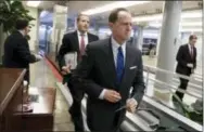  ?? J. SCOTT APPLEWHITE — THE ASSOCIATED PRESS ?? Sen. Pat Toomey, R-Pa., a member of the Senate Budget Committee, heads to the floor during a series of votes at the Capitol in Washington on Thursday.