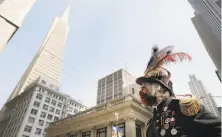  ??  ?? Amster, as Emperor Norton, leads a tour along Montgomery Street. He’s one of a number of small tour outfits that are back.