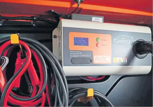  ?? ?? EV BOOST: RAC breakdown recovery aims to fit a fifth of its fleet with the emergency chargers by the end of the year.