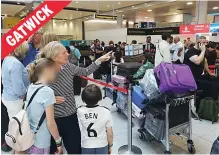  ?? Pictures: @ANDY M STEPHENS, LNP ?? Passengers are forced to wait after delays at the check-in