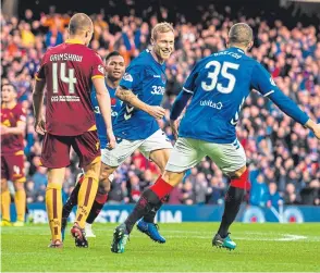  ?? SNS. ?? Scott Arfield celebrates after scoring Rangers’ opening goal.