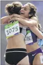  ?? DAVID J. PHILLIP / AP ?? New Zealand’s Nikki Hamblin (left) got a hand from American Abbey D’Agostino on the Olympic track.